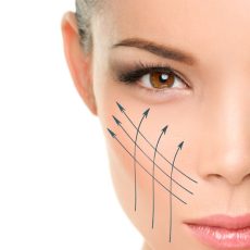 36325126 - face lift anti-aging treatment - asian woman portrait with graphic lines showing facial lifting effect on perfect skin. skincare cosmetic concept.